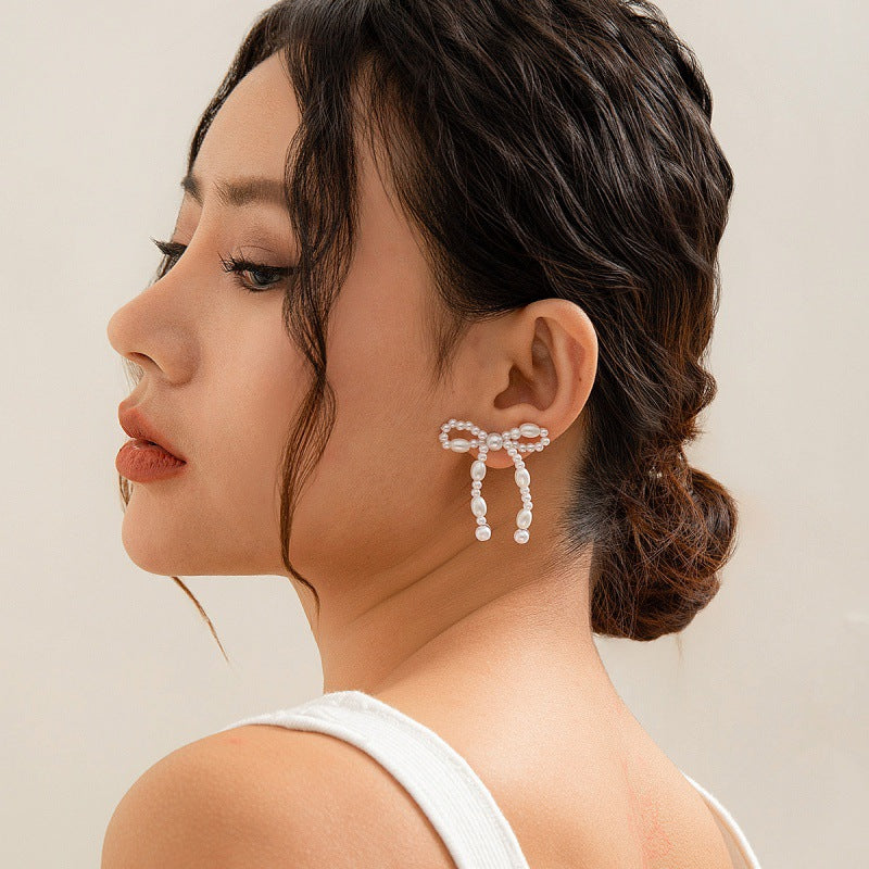 Wholesale Bow French Tassel Earrings Simple Light Luxury Imitation Pearl Earrings